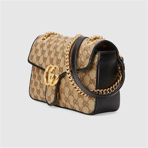 gucci coated monogram double chain handle with tassel handbag large|Gucci designer handbags.